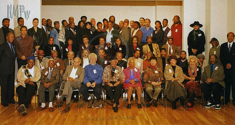 Historic 1990s photo of Renown African-American Fine Artists at the Schomburg Cultural Center in Harlem